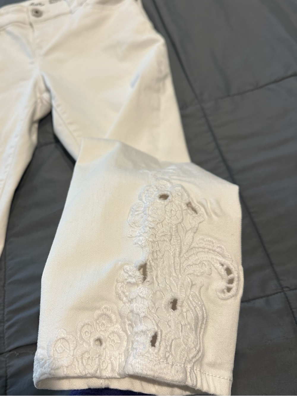 INC white denim cropped jeans with embroidered detail